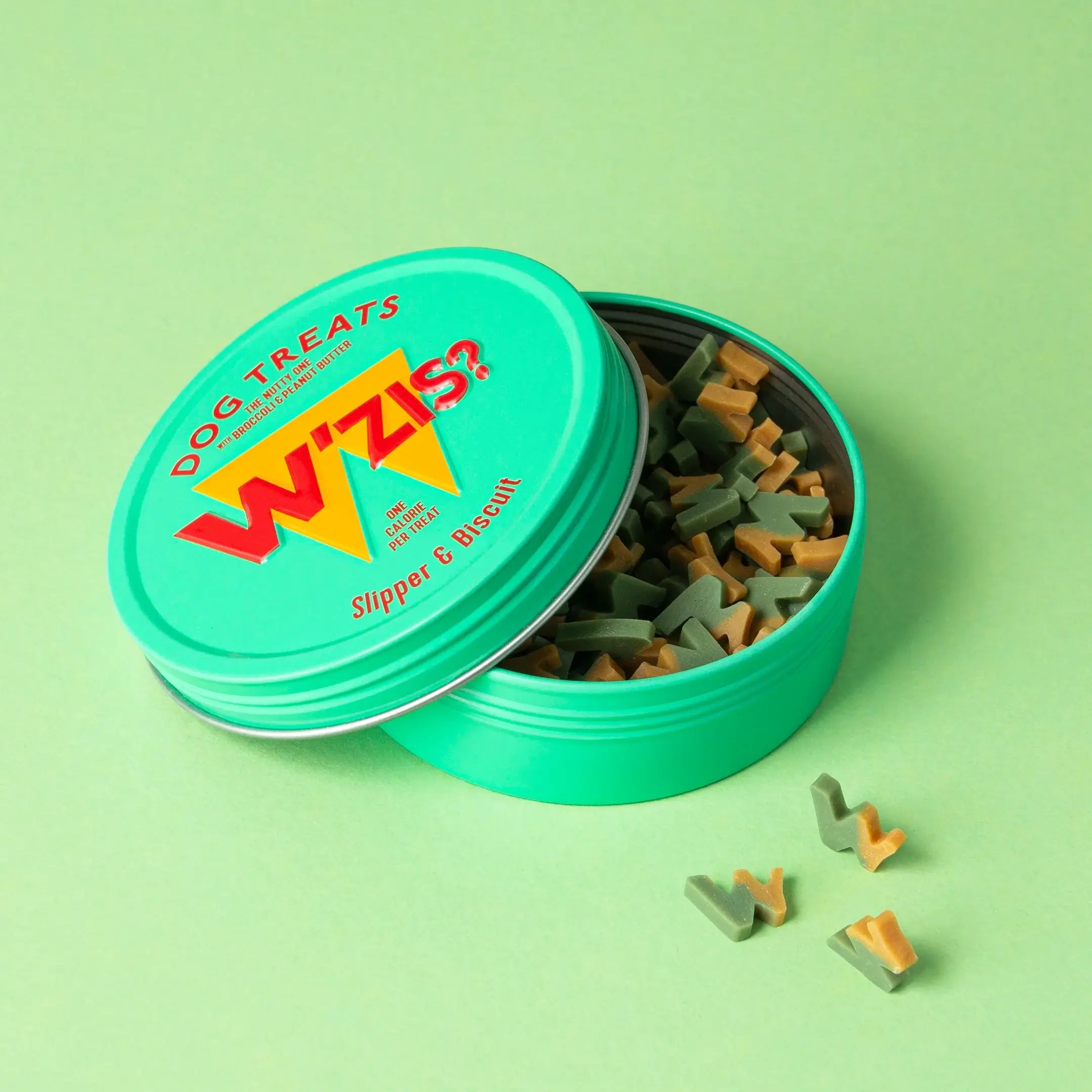 W'ZIS Slipper & Biscuit plant-based dog treats in a green tin